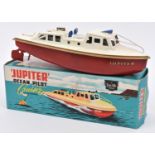 Sutcliffe tinplate clockwork Jupiter Ocean Pilot Cruiser. In white and red, with gold band and