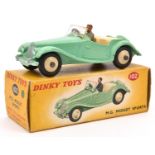 A Dinky Toys M.G. Midget Sports 102. Pale green body, cream interior and wheels. With grey suited