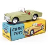 Corgi Toys Triumph TR3 Sports Car (305). In light metallic green with red interior, smooth wheels