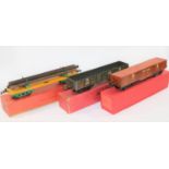 3 Hornby O Gauge bogie freight wagons. No.2 Lumber Wagon in yellow and green, with lumber load. Plus