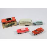 5 1960's Norev plastic vehicles. A Chrysler New Yorker Convertible in salmon pink, with a good