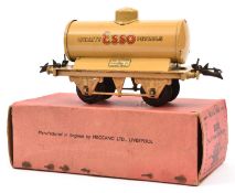 A scarce Hornby O Gauge Petrol Tank Wagon. Example in light brown with 'Quality ESSO petrols' to