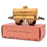 A scarce Hornby O Gauge Petrol Tank Wagon. Example in light brown with 'Quality ESSO petrols' to