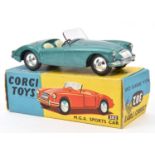 Corgi Toys M.G.A. Sports Car (302). Example in metallic green with cream seats and dished spun