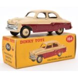 Dinky Toys Vauxhall Cresta Saloon (164). Example in maroon and cream with cream wheels. Boxed, minor