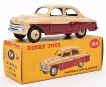 Dinky Toys Vauxhall Cresta Saloon (164). Example in maroon and cream with cream wheels. Boxed, minor