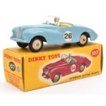 A Dinky Toys Sunbeam Alpine Sports. 107. Pale blue body with cream interior and wheels. RN 26. White