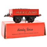 A Hornby 'O' gauge Coal Wagon. In red with 'Meccano' to sides. Boxed, some wear. Contents VGC,