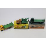 3 Dinky Toys. Guy Flat Truck - with tailboard (513). Dark green cab and chassis with mid green