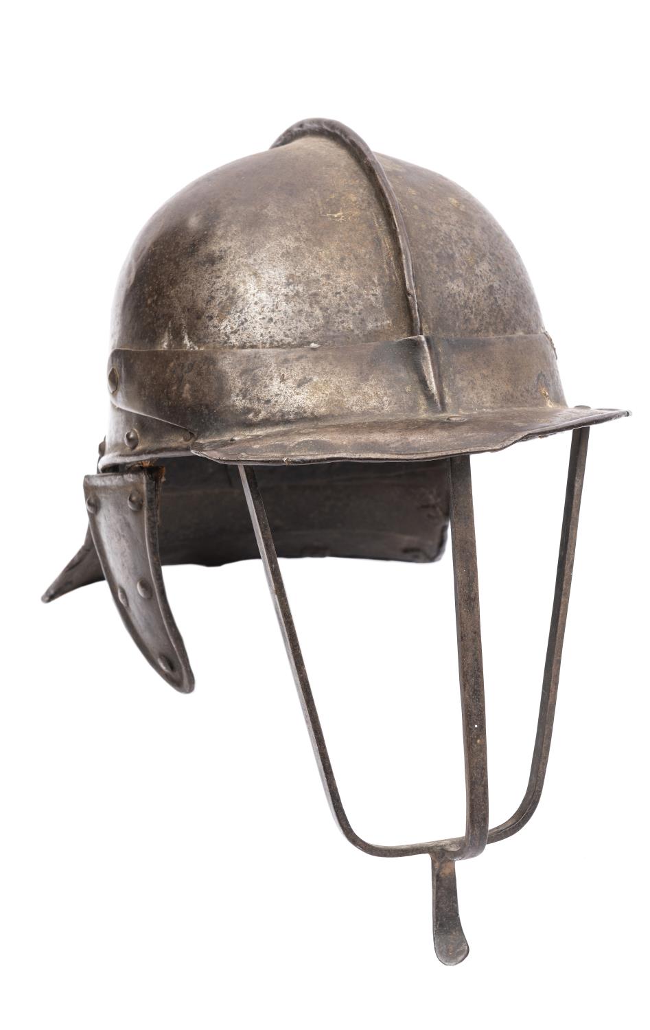 A Cromwellian trooper's lobster tail helmet, the skull formed in two parts, the hinged visor