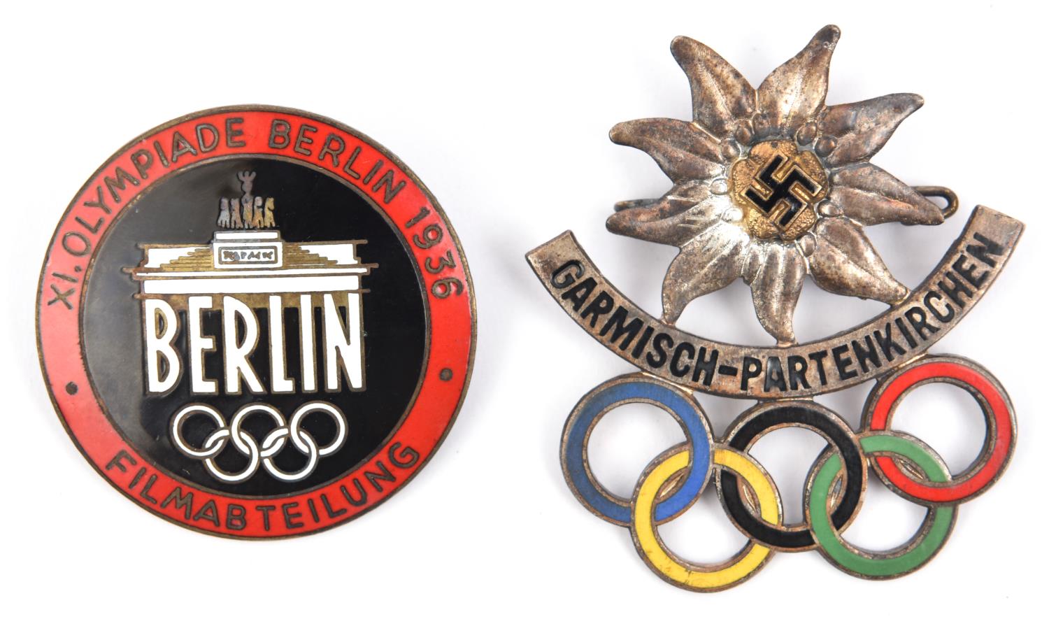 A Third Reich circular enamelled pin back badge, the centre with Olympic stadium and "Berlin"