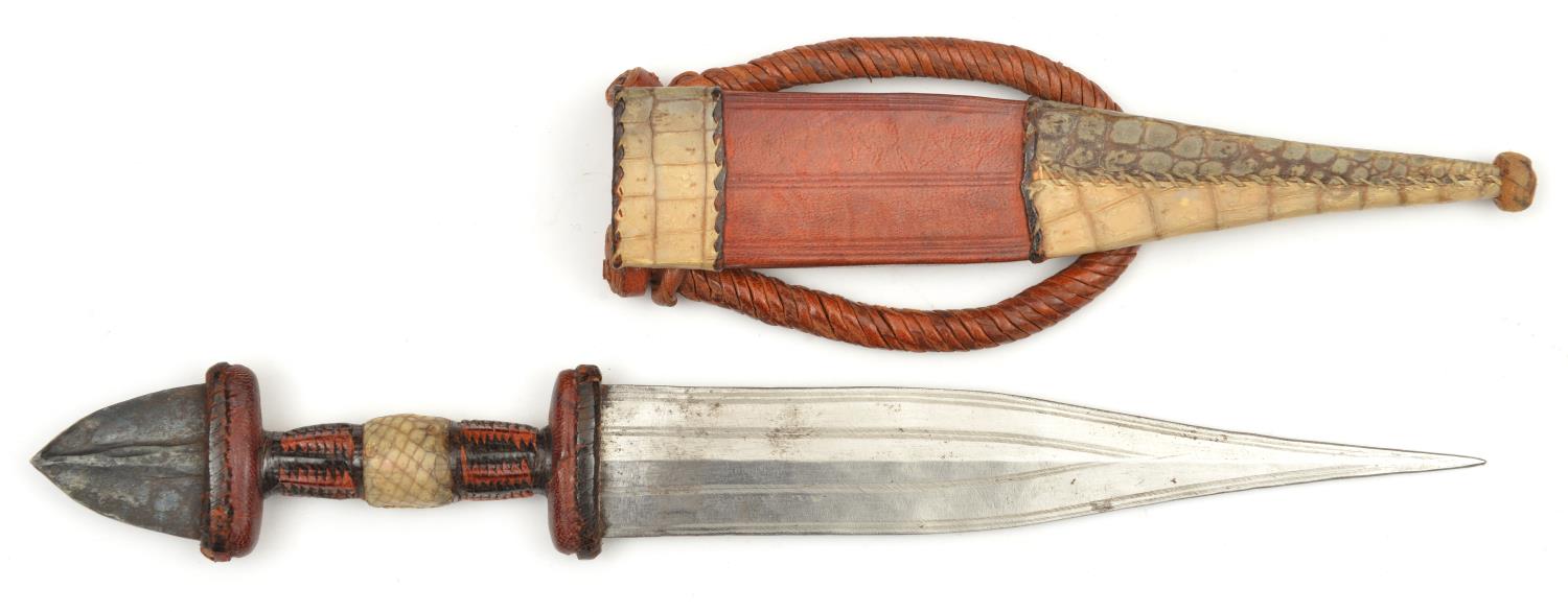 A well made North African tribal dagger. 2nd half of the 20th century, broad DE tapered blade 19cms, - Image 2 of 3