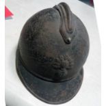 A WWI period French Adrian pattern steel helmet, grenade badge with "RF" on ball, leather liner.