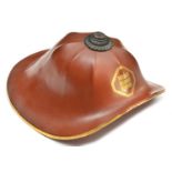 A Japanese retainer's helmet jingasa. Of octagonal kabuto form, up-turned brim, brown lacquered