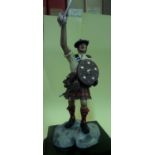 A Stadden figure of a Highland Chieftain, c 1745, complete with targe and drawn sword, mounted on