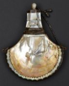 An Indian mother of pearl powder flask. Maximum 18cms, fan-shaped body with reinforced edges,