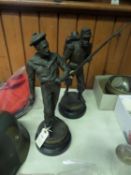 A pair of bronzed hollow spelter figures of 19th century French servicemen: bearded sailor clutching