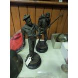 A pair of bronzed hollow spelter figures of 19th century French servicemen: bearded sailor clutching