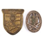 A Third Reich Krim shield, no cloth backing but with brass back plate; also a General Assault badge,