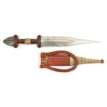 A well made North African tribal dagger. 2nd half of the 20th century, broad DE tapered blade 19cms,