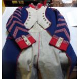 A Paris Fire Brigade blue tunic, WM buttons; a US army officer's greatcoat; 4 theatrical uniform