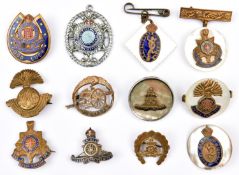 12 sweetheart badges,including MOP roundels RA with "silver" rim, R Fus, R Sussex and Signals,