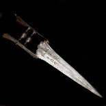 An Indian (Vijayanagaran) dagger "hooded" katar. 16th or early 17th century, broad tapered blade