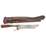 A short machete wedung from Java or Bali. Blade 6¾" with unusual hatchet point, long tang with