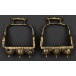 A pair of South Indian cast brass stirrups. Probably 19th century, each with 3 pierced hemispheres