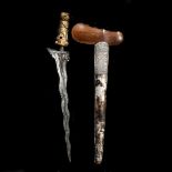 A Balinese dagger kris. Wavy black and silver coloured pamor blade 41 cms, 19th century or