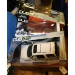 4 1:18 scale vehicles. 3x Dub City Big Ballers - GMC Yukon Denali in black. Lincoln Navigator in