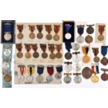 An accumulation of London School Attendance and Good Conduct medals, mostly WM and including many