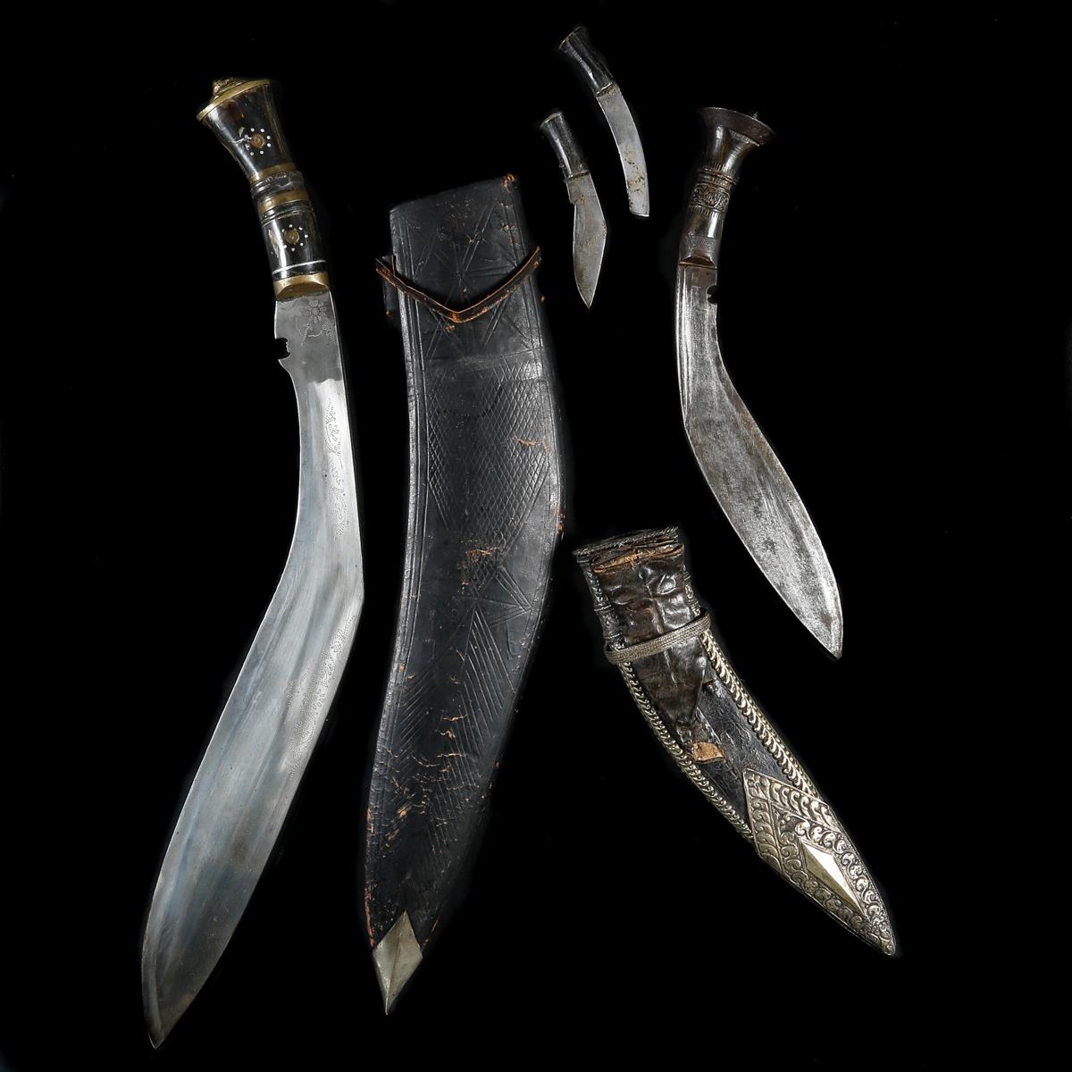 A large Indian kukri. 20th century, blade 51.5cms stamped 'India', horn hilt with brass mounts - Image 2 of 3