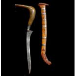 A North Sumatran dagger rencong, Aceh 19th century, curved SE blade 20cms (refinished), one piece