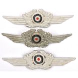 Three Third Reich Luftwaffe NCO's aluminium cap wing cockades, each with different type prong and