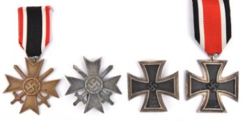 Third Reich medals: 1939 Iron Cross 2nd Class, in printed paper packet and War Merit Cross 2nd Class