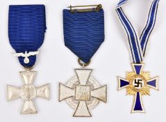 Third Reich medals: armed forces 18 year service cross with army eagle on the ribbon; 2nd class