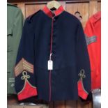 A senior NCO's blue tunic, c 1905, scarlet facings and piping, gilt braid to collar and braided