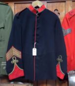 A senior NCO's blue tunic, c 1905, scarlet facings and piping, gilt braid to collar and braided