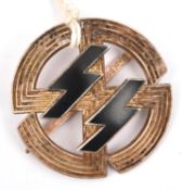 A Third Reich Germanic Proficiency runes badge, silver plated with enamelled SS runes, the reverse