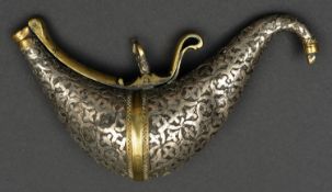 A Persian powder flask, Qjar dynasty, 15cms, bird shaped tinned brass body applied with a