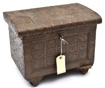 A sheet copper covered rectangular casket, the sides and rounded lid embossed overall with small