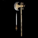 An Indian axe from Bhuj. Late 19th century, iron crescent edge 13cms, gilt brass head and haft