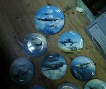 A set of 11 Coalport limited edition bone china plates, bearing colour prints of iconic British