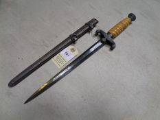 A Third Reich Army officer's dagger, by WKC Solingen, the hilt with grey metal mounts, the