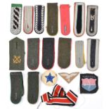 15 various Third Reich single epaulettes, mostly plain with coloured piping, 2 for Unteroffizier,