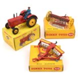 3 Dinky Toys Farm Items. A Massey-Harris Tractor (300) late example in bright red with yellow