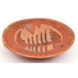 An interesting polished red earthenware dish, with 5/8th" bamboo and raffia work rims, the inside
