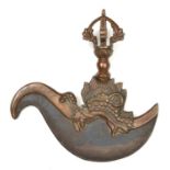 A Tibetan ritual chopper karttrika. Iron blade 17cms supported by a copper dragon head beneath a