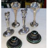 A pair of silver candle sticks with weighted bases. Hall-marked Birmingham 1907. Maker George Unite.